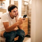 Using Phone In Toilet